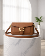 Loéna | dames handtas – met goudkleurige details