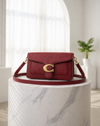 Loéna | dames handtas – met goudkleurige details