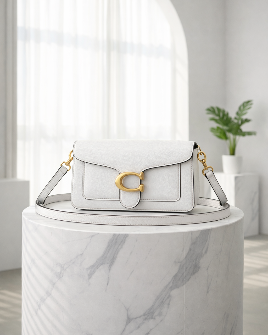 Loéna | dames handtas – met goudkleurige details