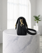 Loéna | dames handtas – met goudkleurige details